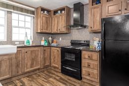 The THE SOCIAL 72 Kitchen. This Manufactured Mobile Home features 3 bedrooms and 2 baths.