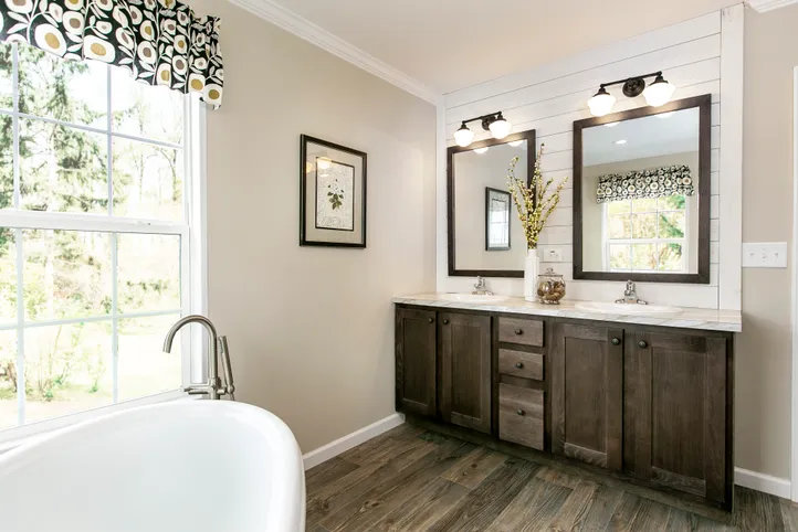The FREEDOM FARM HOUSE  32X60 Primary Bathroom. This Manufactured Mobile Home features 3 bedrooms and 2 baths.