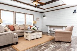 The THE BRAZOS Living Room. This Manufactured Mobile Home features 3 bedrooms and 2.5 baths.