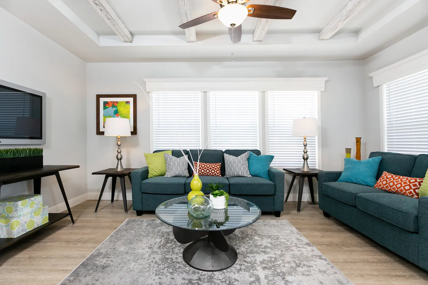 The CORONADO 2458B Living Room. This Manufactured Mobile Home features 3 bedrooms and 2 baths.