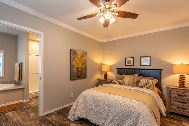The K1676H Primary Bedroom. This Manufactured Mobile Home features 3 bedrooms and 2 baths.