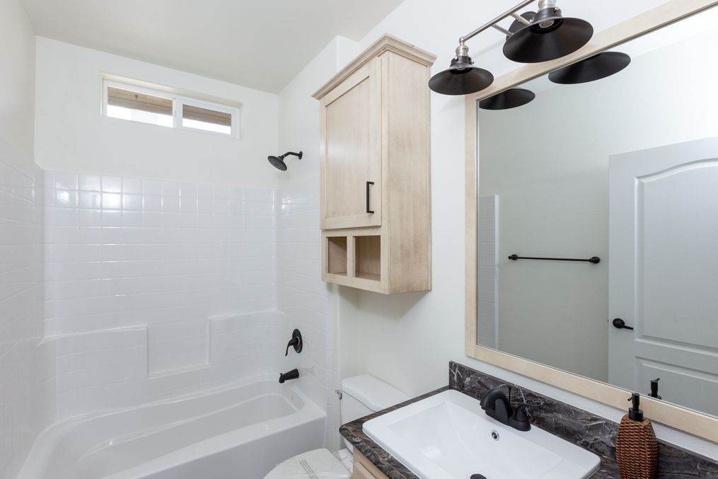 The 2848 MARLETTE SPECIAL Guest Bathroom. This Manufactured Mobile Home features 3 bedrooms and 2 baths.