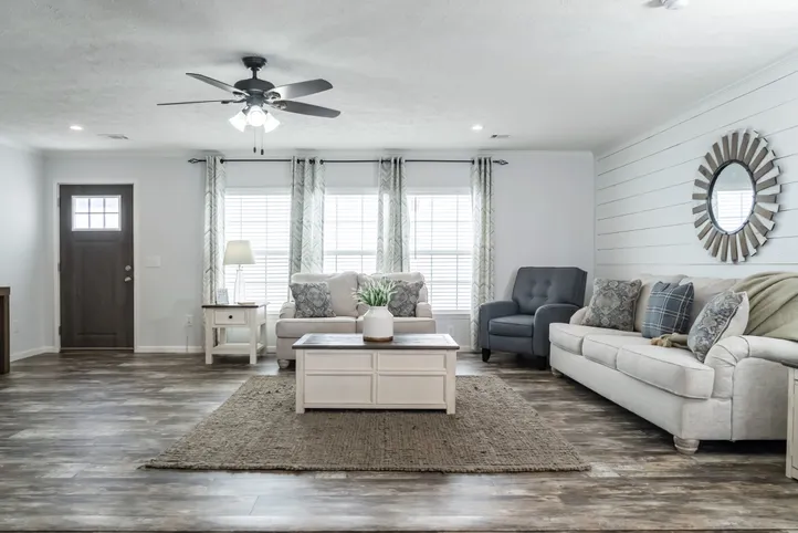 The THE LEAHY Living Room. This Manufactured Mobile Home features 4 bedrooms and 2 baths.