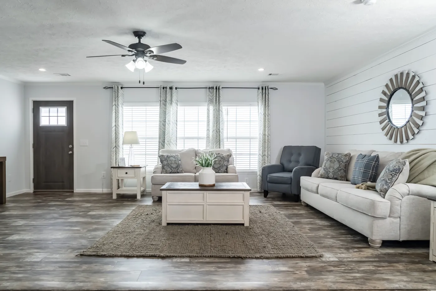 The THE LEAHY Living Room. This Manufactured Mobile Home features 4 bedrooms and 2 baths.
