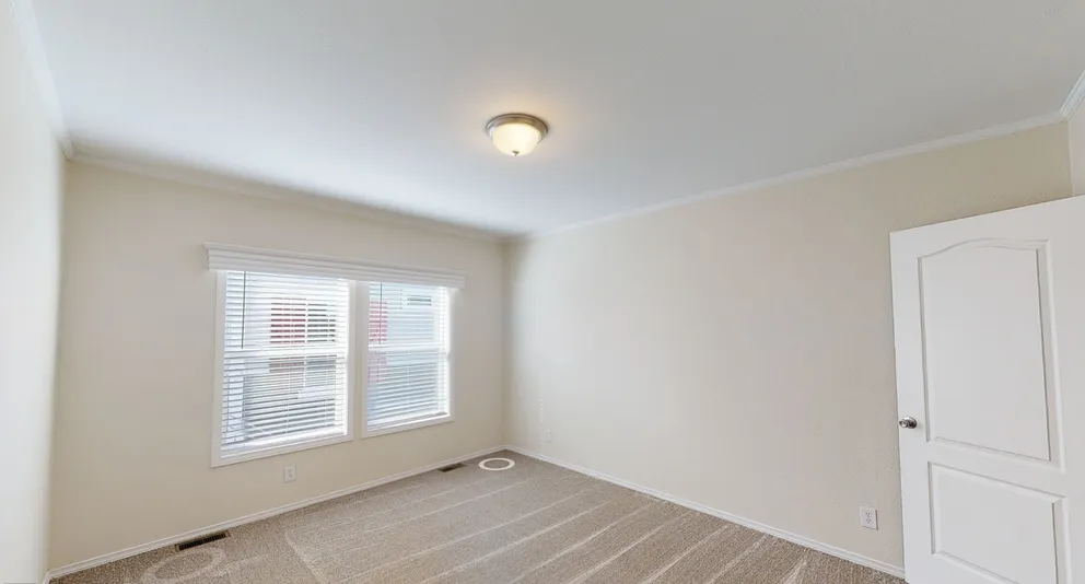 The K3066A Guest Bedroom. This Manufactured Mobile Home features 3 bedrooms and 2 baths.