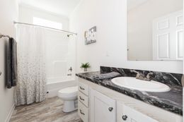 The 2095 HERITAGE Guest Bathroom. This Manufactured Mobile Home features 3 bedrooms and 2 baths.