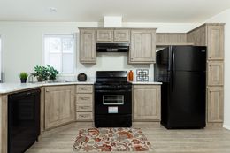The FAIRPOINT 14602A Kitchen. This Manufactured Mobile Home features 2 bedrooms and 2 baths.