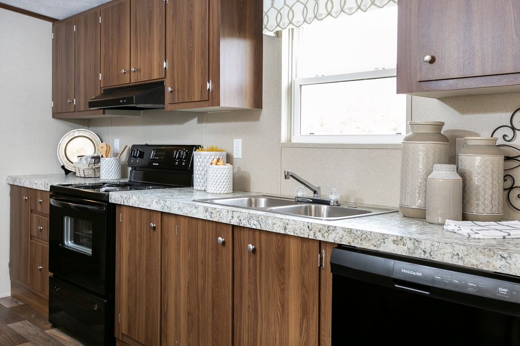 The TRIUMPH Kitchen. This Manufactured Mobile Home features 5 bedrooms and 3 baths.