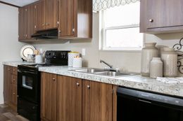 The TRIUMPH Kitchen. This Manufactured Mobile Home features 5 bedrooms and 3 baths.
