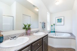 The CK661F Primary Bathroom. This Manufactured Mobile Home features 3 bedrooms and 2 baths.