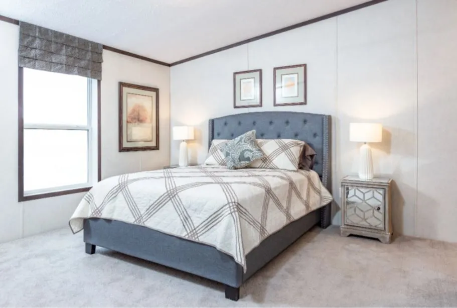 The ZIRCON Primary Bedroom. This Manufactured Mobile Home features 3 bedrooms and 2 baths.