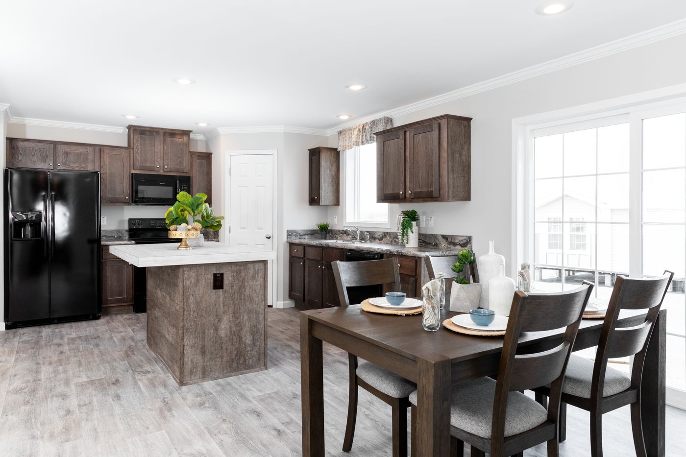 The THE VILLETTE Kitchen. This Manufactured Mobile Home features 3 bedrooms and 2 baths.