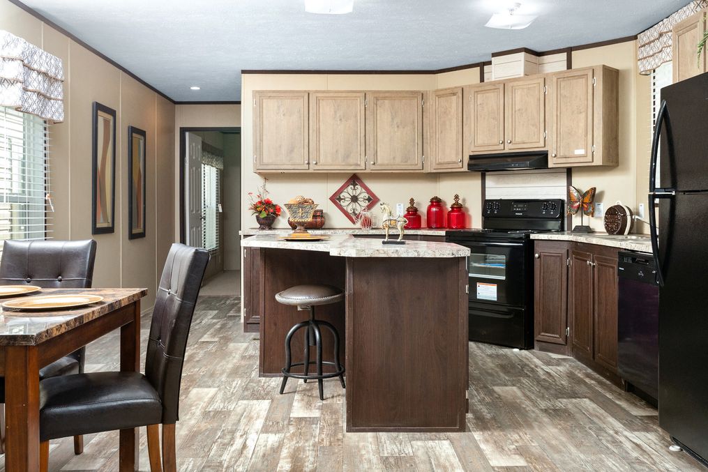 The THE SHERMAN Kitchen. This Manufactured Mobile Home features 3 bedrooms and 2 baths.