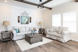 The SOUTHERN CHARM Living Room. This Manufactured Mobile Home features 3 bedrooms and 2 baths.