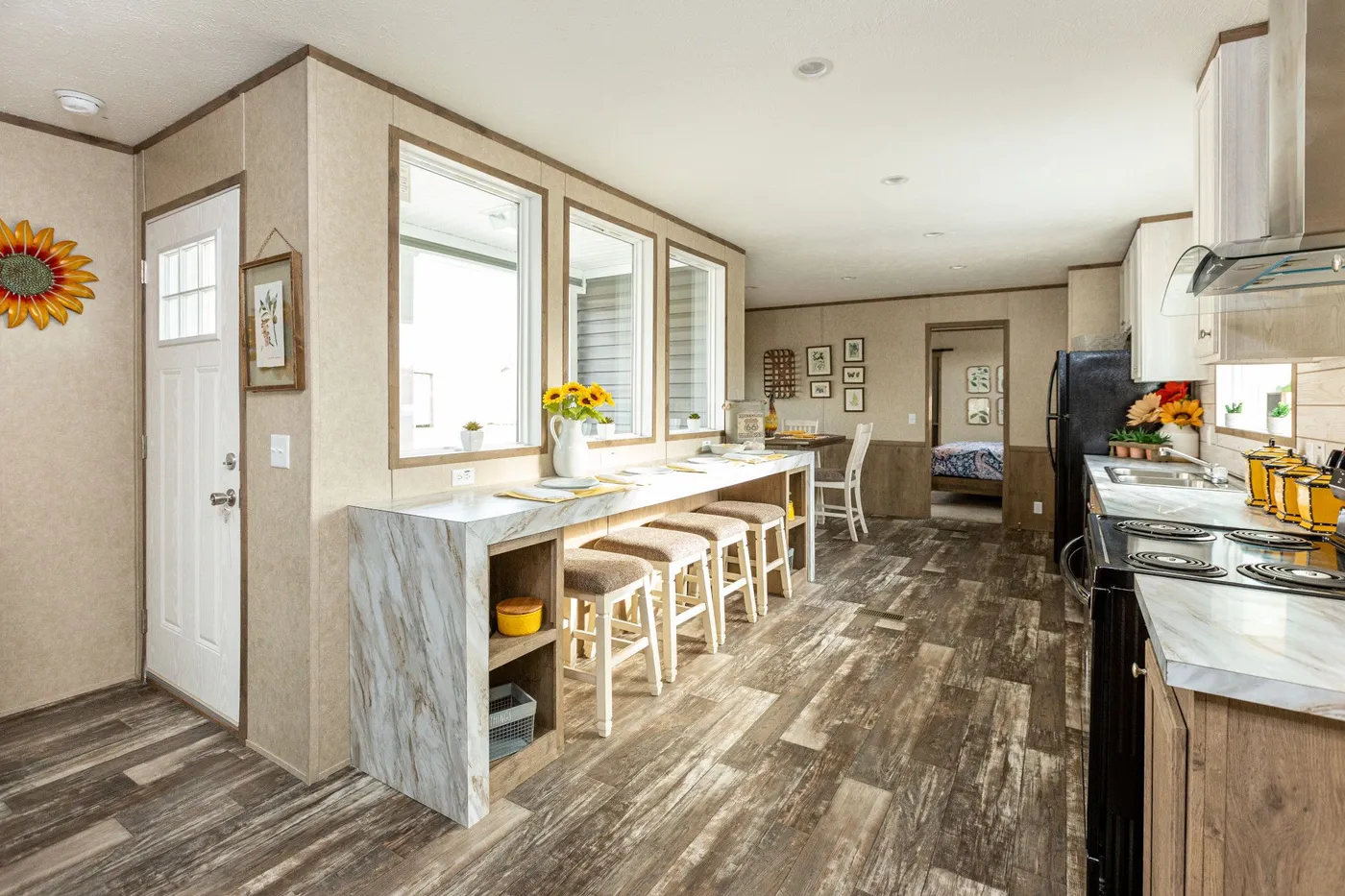 The THE RANCH HOUSE Kitchen. This Manufactured Mobile Home features 3 bedrooms and 2 baths.
