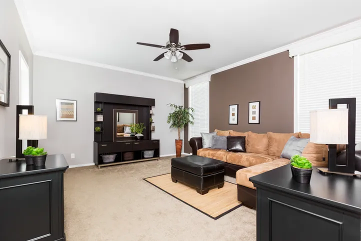 The ENCHANTMENT 3070A Living Room. This Manufactured Mobile Home features 3 bedrooms and 2 baths.
