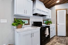 The THE MAVERICK Kitchen. This Manufactured Mobile Home features 4 bedrooms and 2 baths.