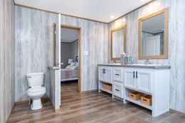 The EVEREST Primary Bathroom. This Manufactured Mobile Home features 4 bedrooms and 2 baths.