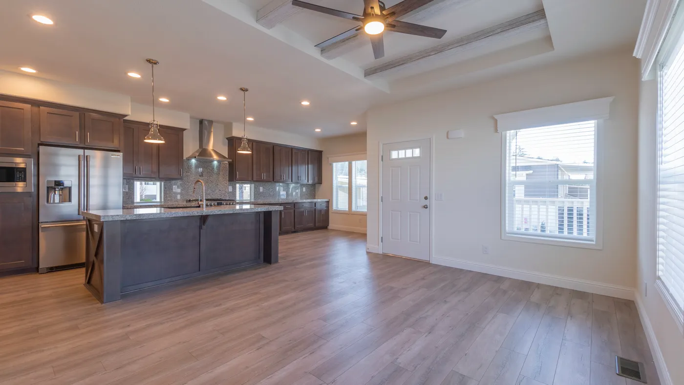 The CORONADO 2456B Living Room. This Manufactured Mobile Home features 3 bedrooms and 2 baths.