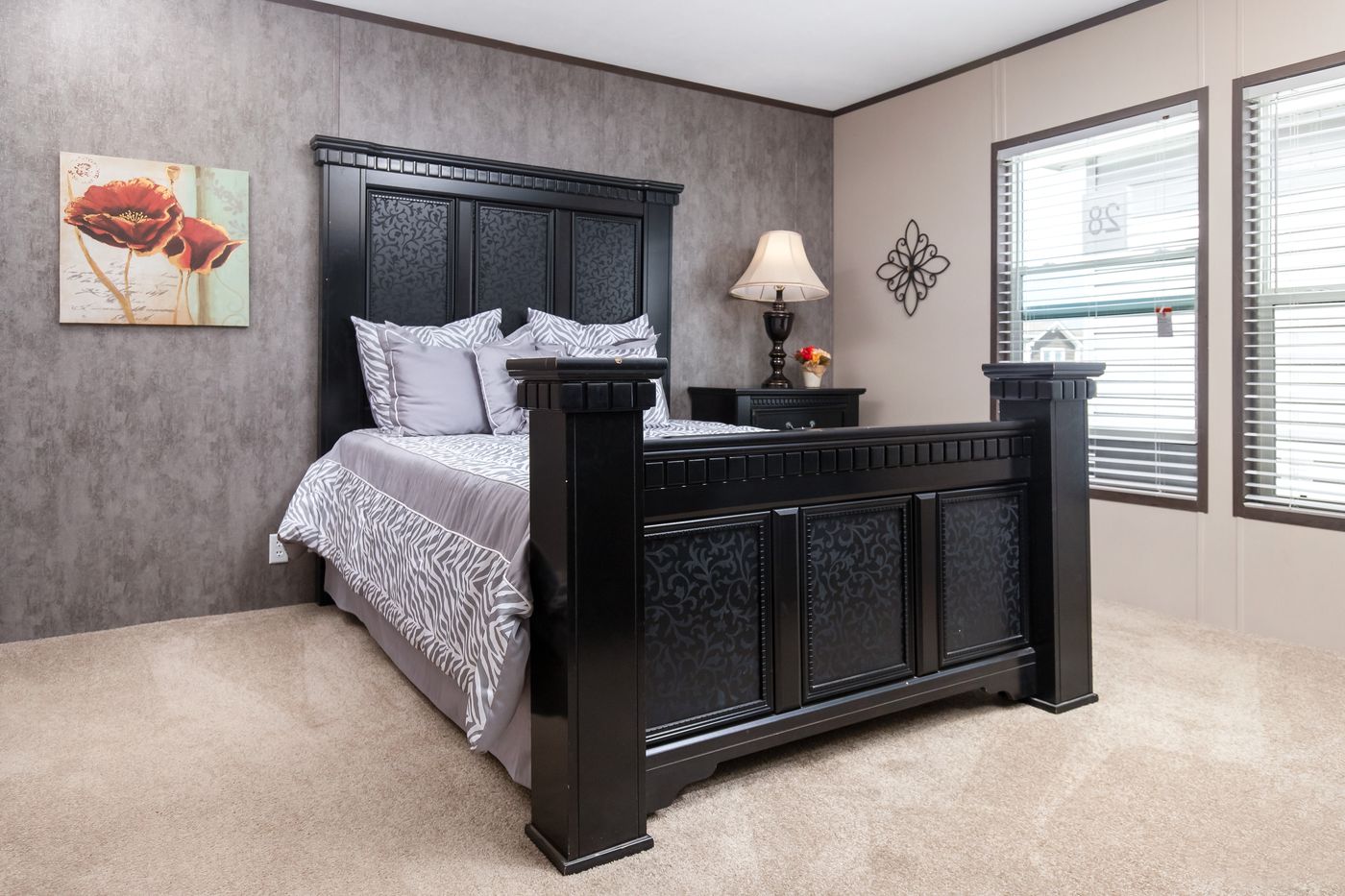 The PT 78 Primary Bedroom. This Manufactured Mobile Home features 3 bedrooms and 2 baths.