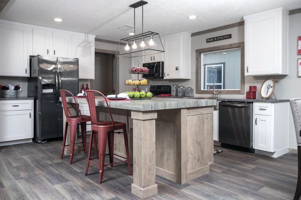 The FARMHOUSE 4 Kitchen. This Manufactured Mobile Home features 4 bedrooms and 2 baths.