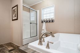 The ULTRO PRO HERCULES Primary Bathroom. This Manufactured Mobile Home features 3 bedrooms and 2 baths.