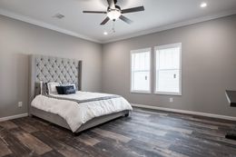 The THE TEAGAN Master Bedroom. This Manufactured Mobile Home features 4 bedrooms and 3 baths.