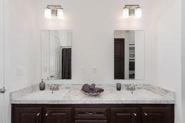 The 1444 CAROLINA Guest Bathroom. This Manufactured Mobile Home features 4 bedrooms and 2 baths.