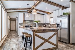 The THE BOBBY JO Kitchen. This Manufactured Mobile Home features 3 bedrooms and 2 baths.