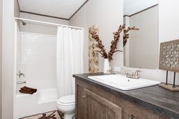 The THE BREEZE Primary Bathroom. This Manufactured Mobile Home features 3 bedrooms and 2 baths.