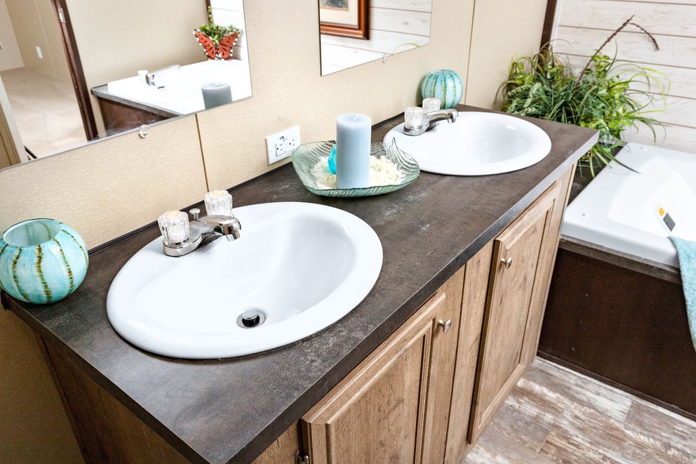 The THE SHERMAN Primary Bathroom. This Manufactured Mobile Home features 3 bedrooms and 2 baths.