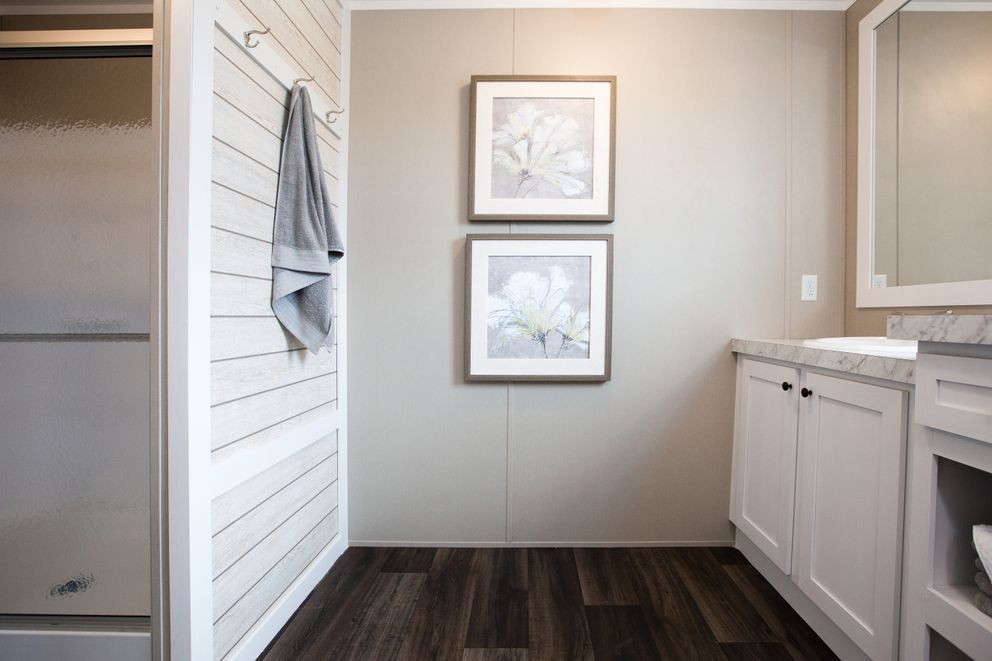 The ISLAND BREEZE Primary Bathroom. This Manufactured Mobile Home features 3 bedrooms and 2 baths.