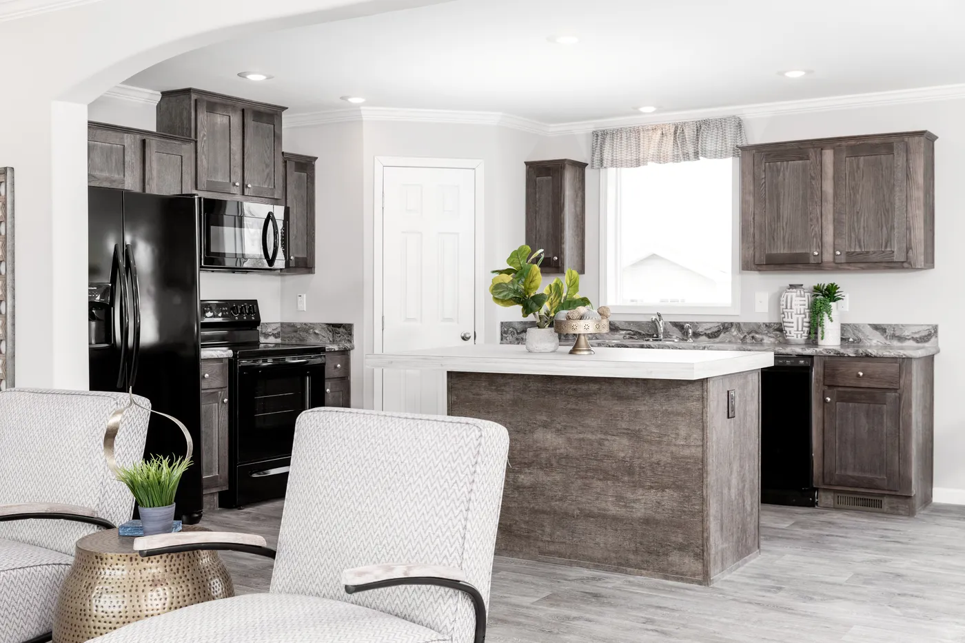 The THE VILLETTE Kitchen. This Manufactured Mobile Home features 3 bedrooms and 2 baths.