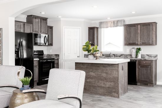 The THE VILLETTE Kitchen. This Manufactured Mobile Home features 3 bedrooms and 2 baths.