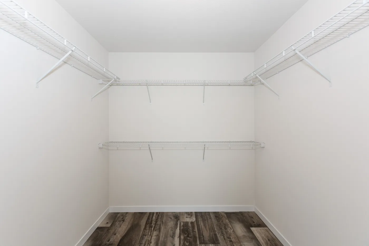 The SOMERSET DR 5228-MS012 SECT Primary Bedroom. This Manufactured Mobile Home features 3 bedrooms and 2 baths.