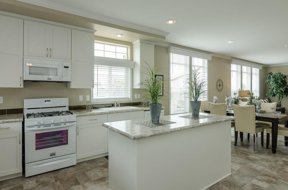The TRANQUILITY TR3062A Kitchen. This Manufactured Mobile Home features 3 bedrooms and 2 baths.
