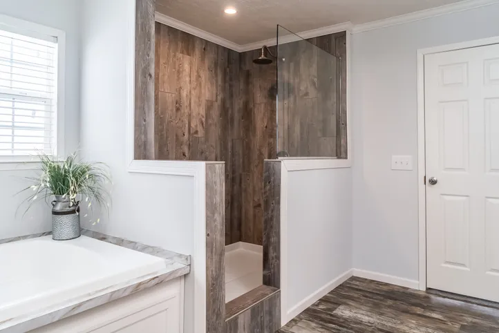 The THE LEAHY Primary Bathroom. This Manufactured Mobile Home features 4 bedrooms and 2 baths.