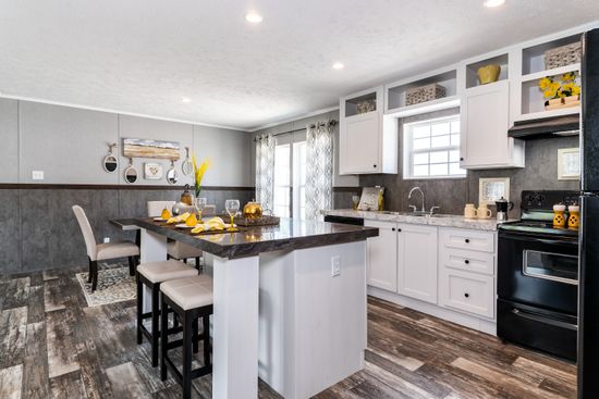 The TRADITION 2868B Kitchen. This Manufactured Mobile Home features 4 bedrooms and 2 baths.