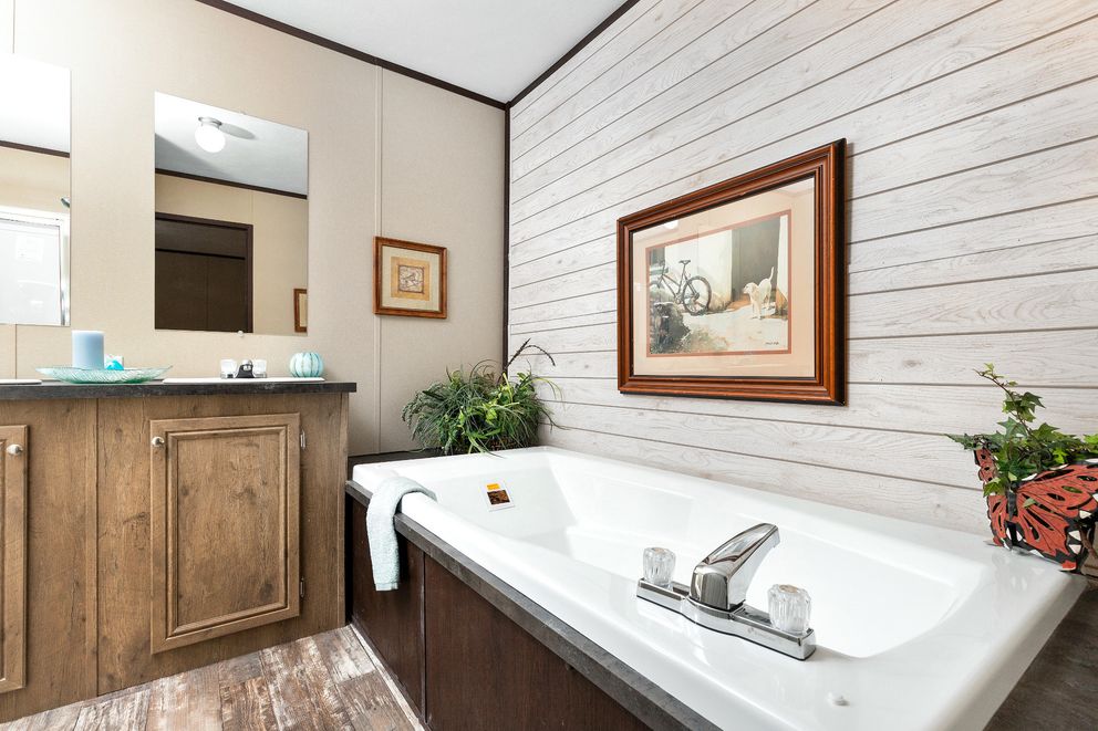The THE SHERMAN Primary Bathroom. This Manufactured Mobile Home features 3 bedrooms and 2 baths.