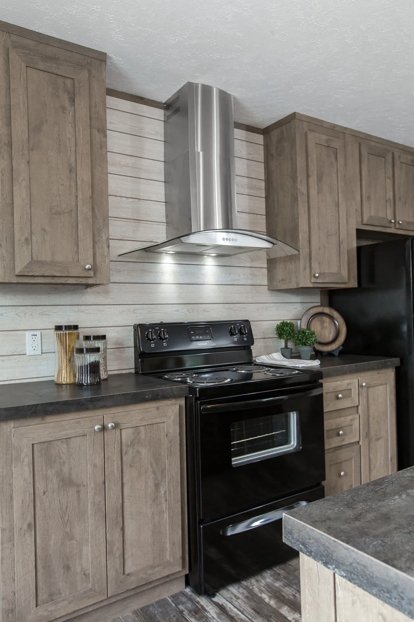 The THE BREEZE Kitchen. This Manufactured Mobile Home features 3 bedrooms and 2 baths.