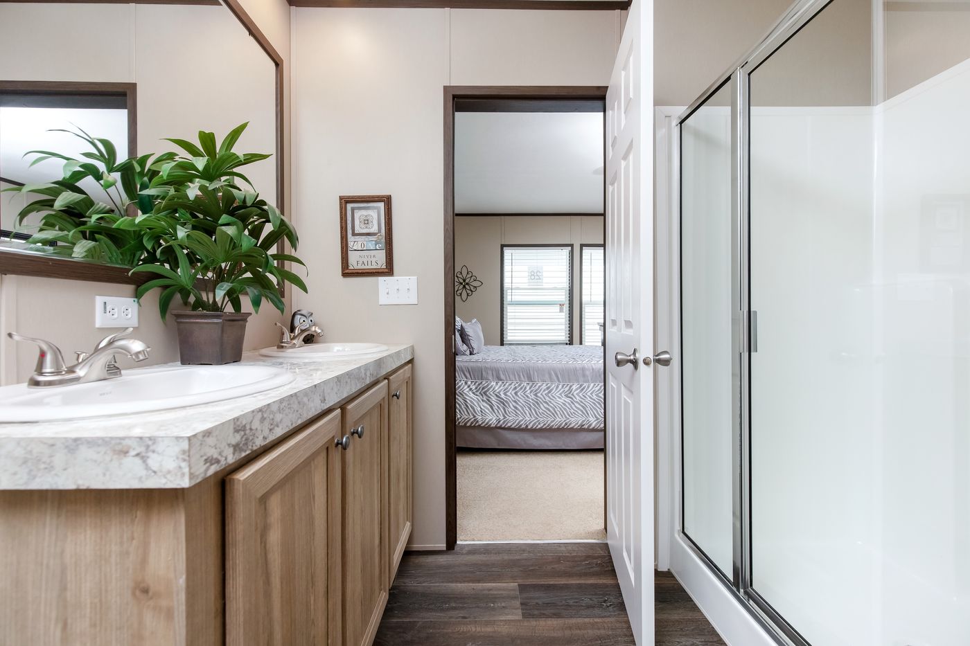 The PT 78 LS Primary Bathroom. This Manufactured Mobile Home features 3 bedrooms and 2 baths.