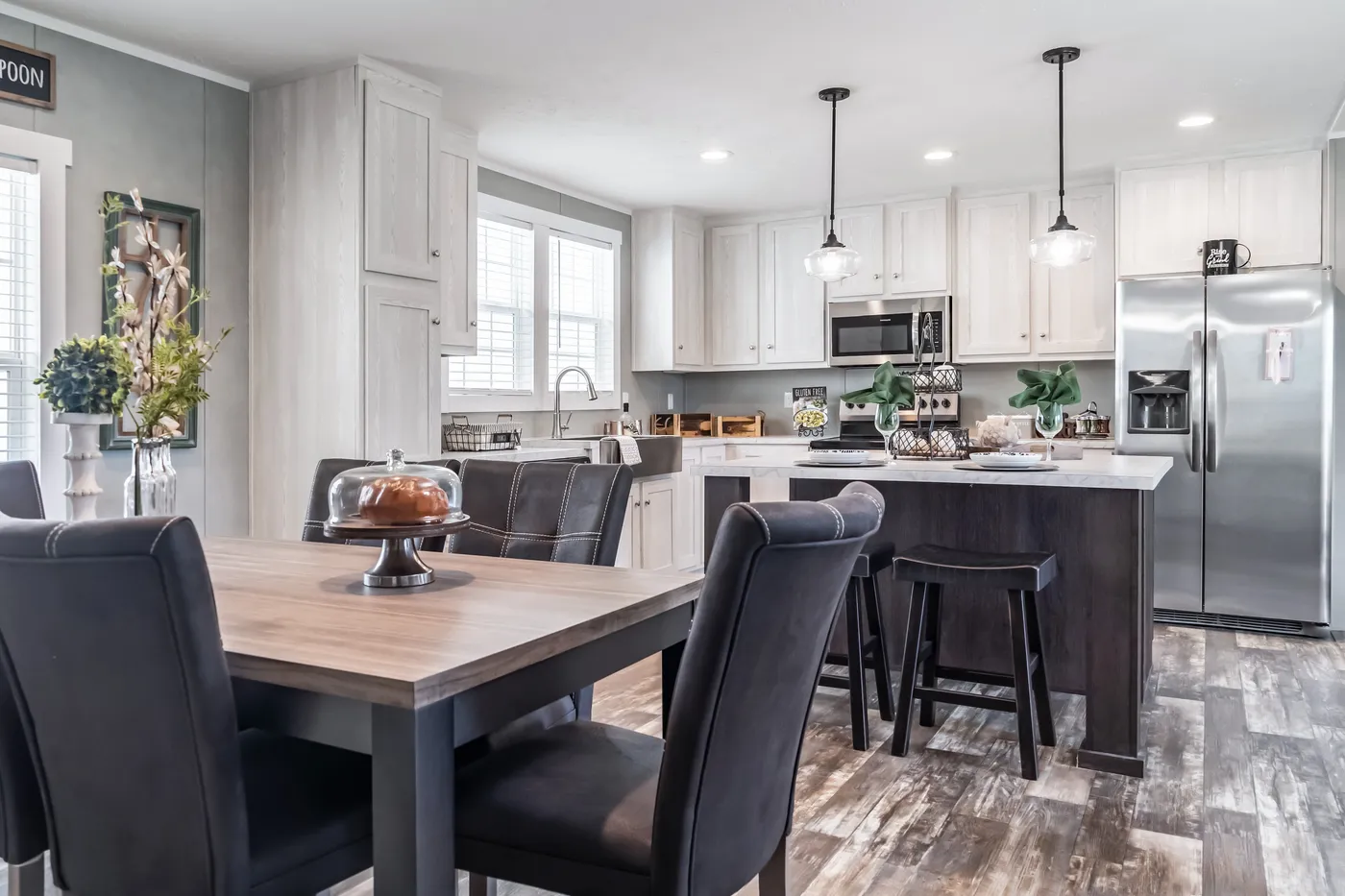 The ULTRA BREEZE 52 Dining Area. This Manufactured Mobile Home features 3 bedrooms and 2 baths.