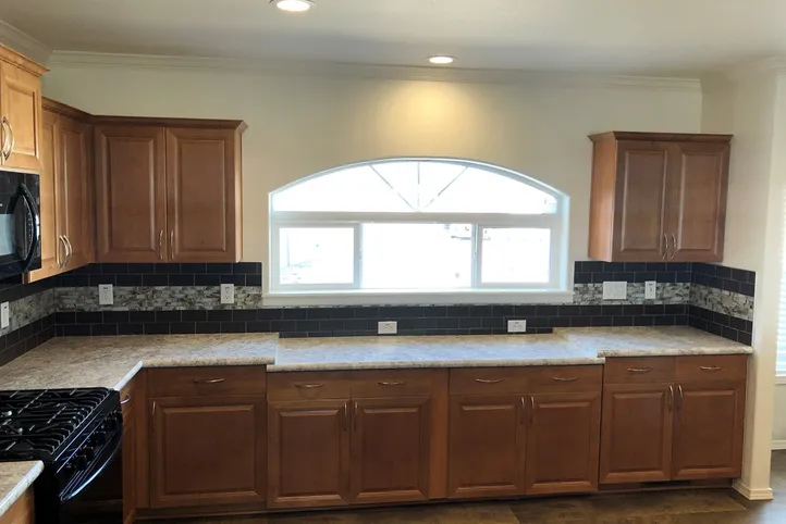 The K3066A Kitchen. This Manufactured Mobile Home features 3 bedrooms and 2 baths.