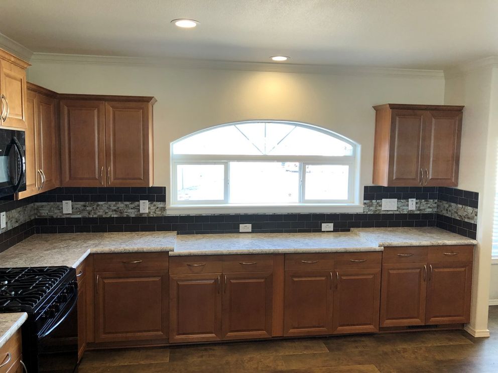 The K3066A Kitchen. This Manufactured Mobile Home features 3 bedrooms and 2 baths.