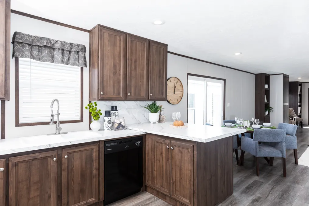 The THE REFLECTIONS Kitchen. This Manufactured Mobile Home features 3 bedrooms and 2 baths.