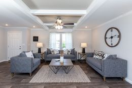 The THE FREEDOM GRAND 4BR 32X62 Living Room. This Manufactured Mobile Home features 4 bedrooms and 2 baths.