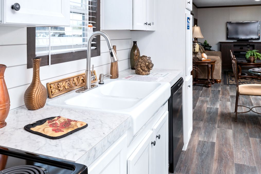 The THE CHOICE Kitchen. This Manufactured Mobile Home features 4 bedrooms and 2 baths.