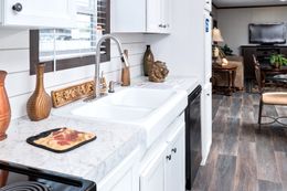 The THE CHOICE Kitchen. This Manufactured Mobile Home features 4 bedrooms and 2 baths.