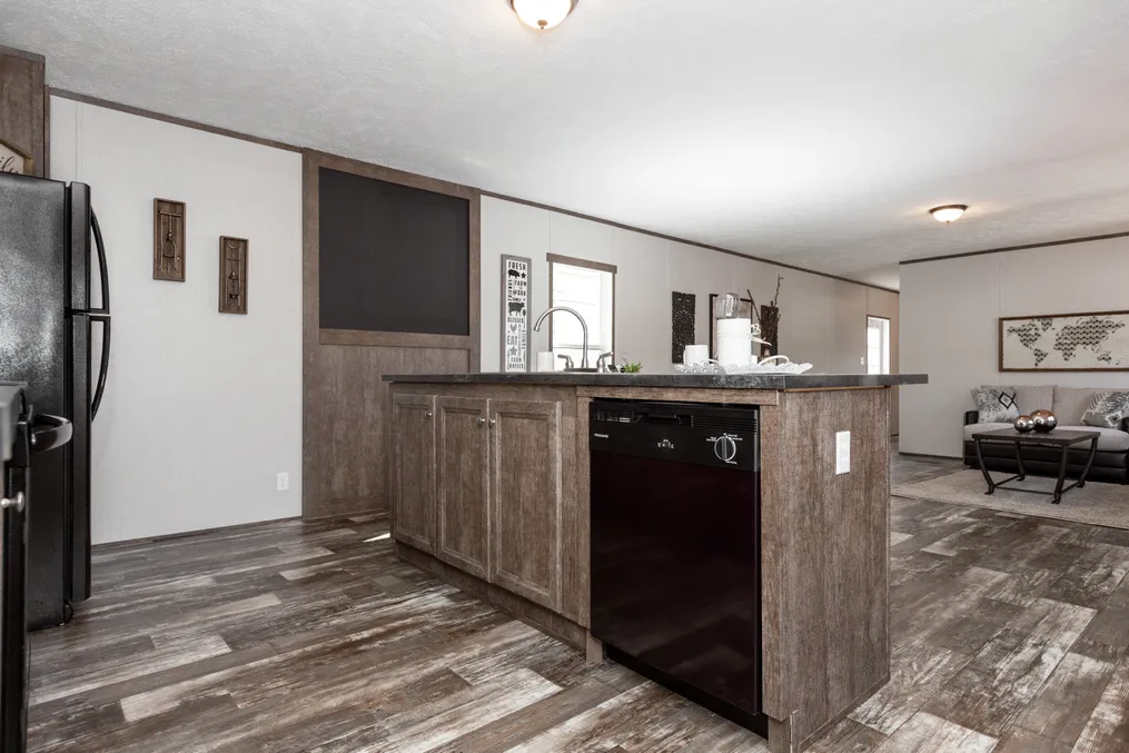 The THE BREEZE Kitchen. This Manufactured Mobile Home features 3 bedrooms and 2 baths.