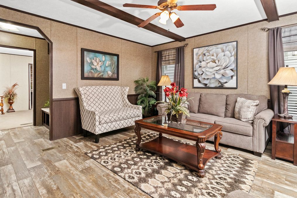 The THE PARKSIDE Living Room. This Manufactured Mobile Home features 3 bedrooms and 2 baths.